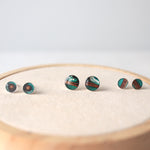 Load image into Gallery viewer, birch bark studs with sterling silver cups and blue resin by Wild Blue Yonder
