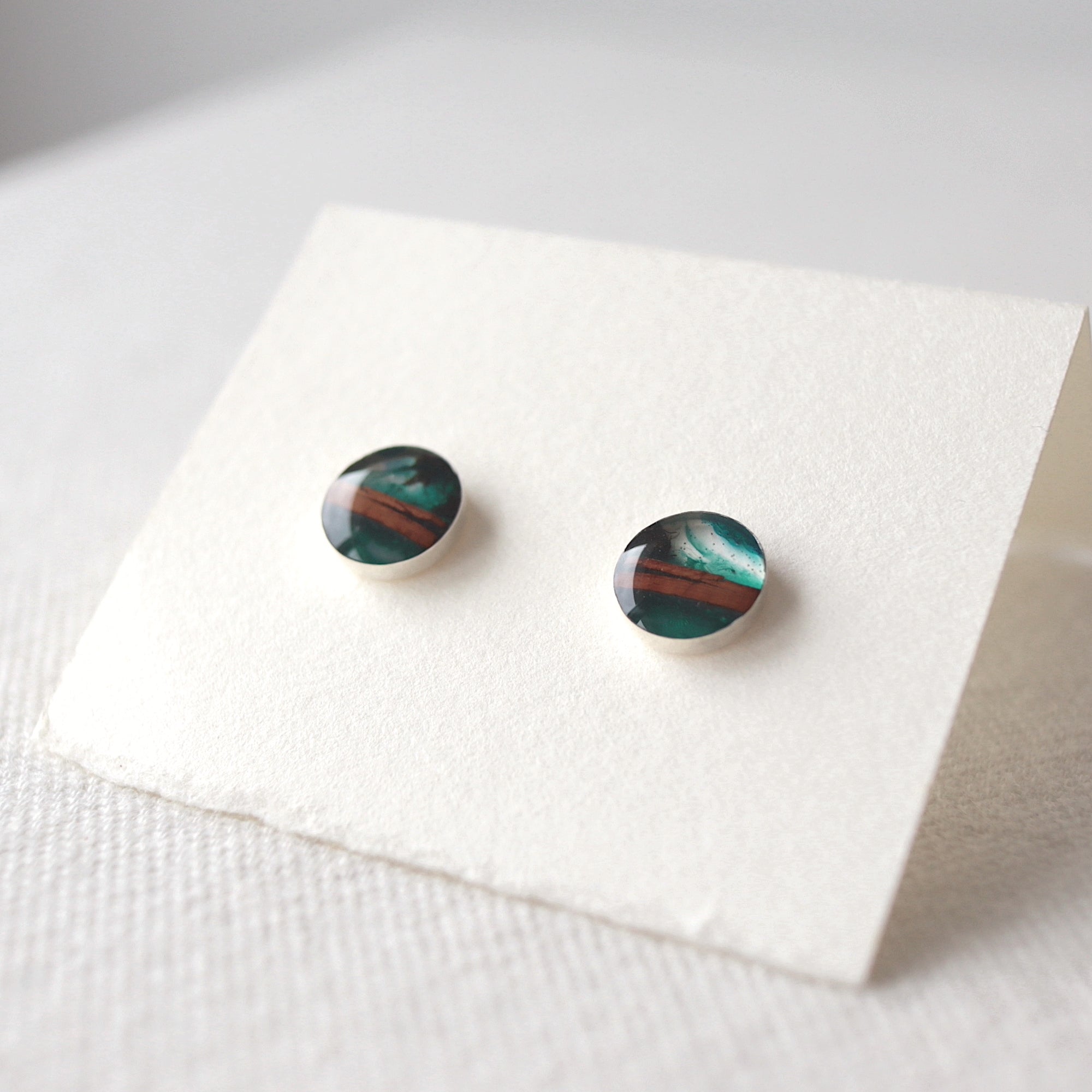 birch bark studs with sterling silver cups and blue resin by Wild Blue Yonder