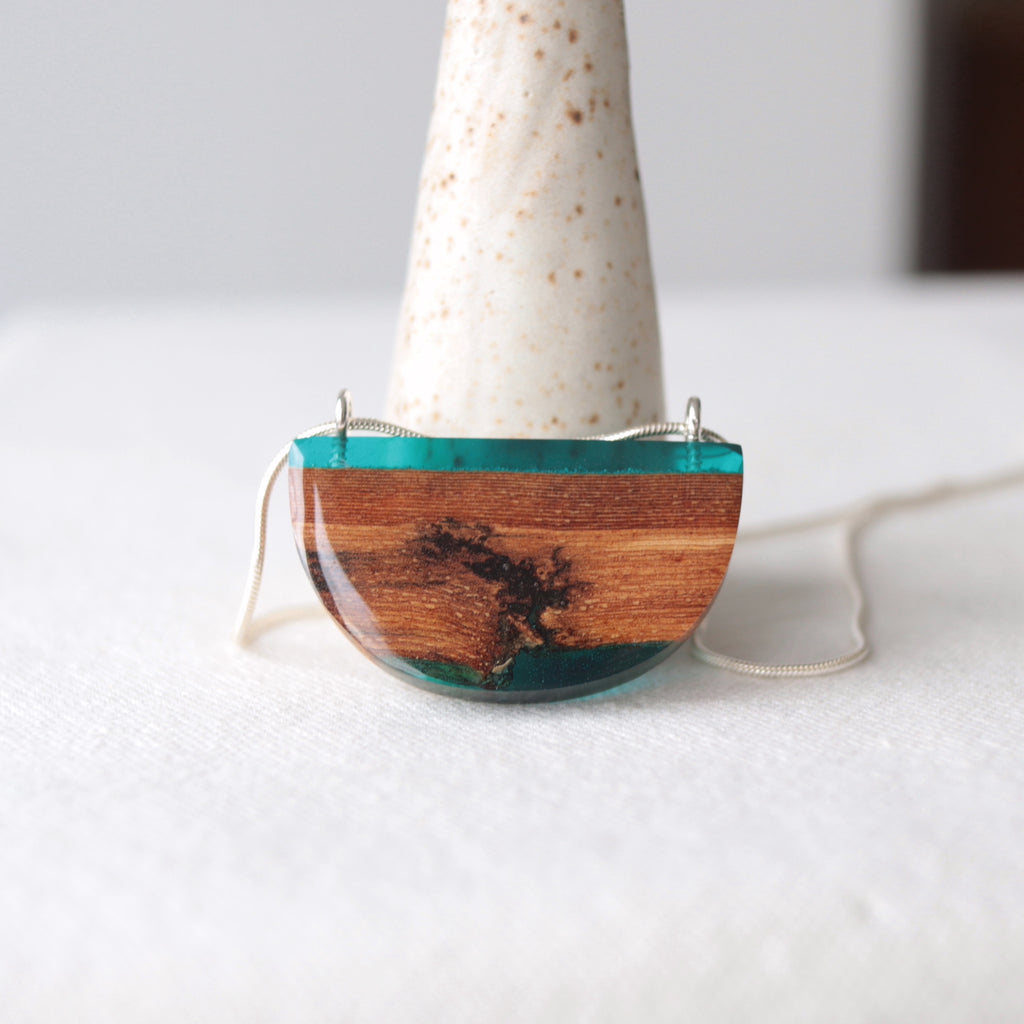 Reclaimed wood bark pendant with blue resin and silver chain by Wild Blue Yonder