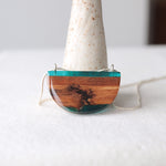 Load image into Gallery viewer, Reclaimed wood bark pendant with blue resin and silver chain by Wild Blue Yonder
