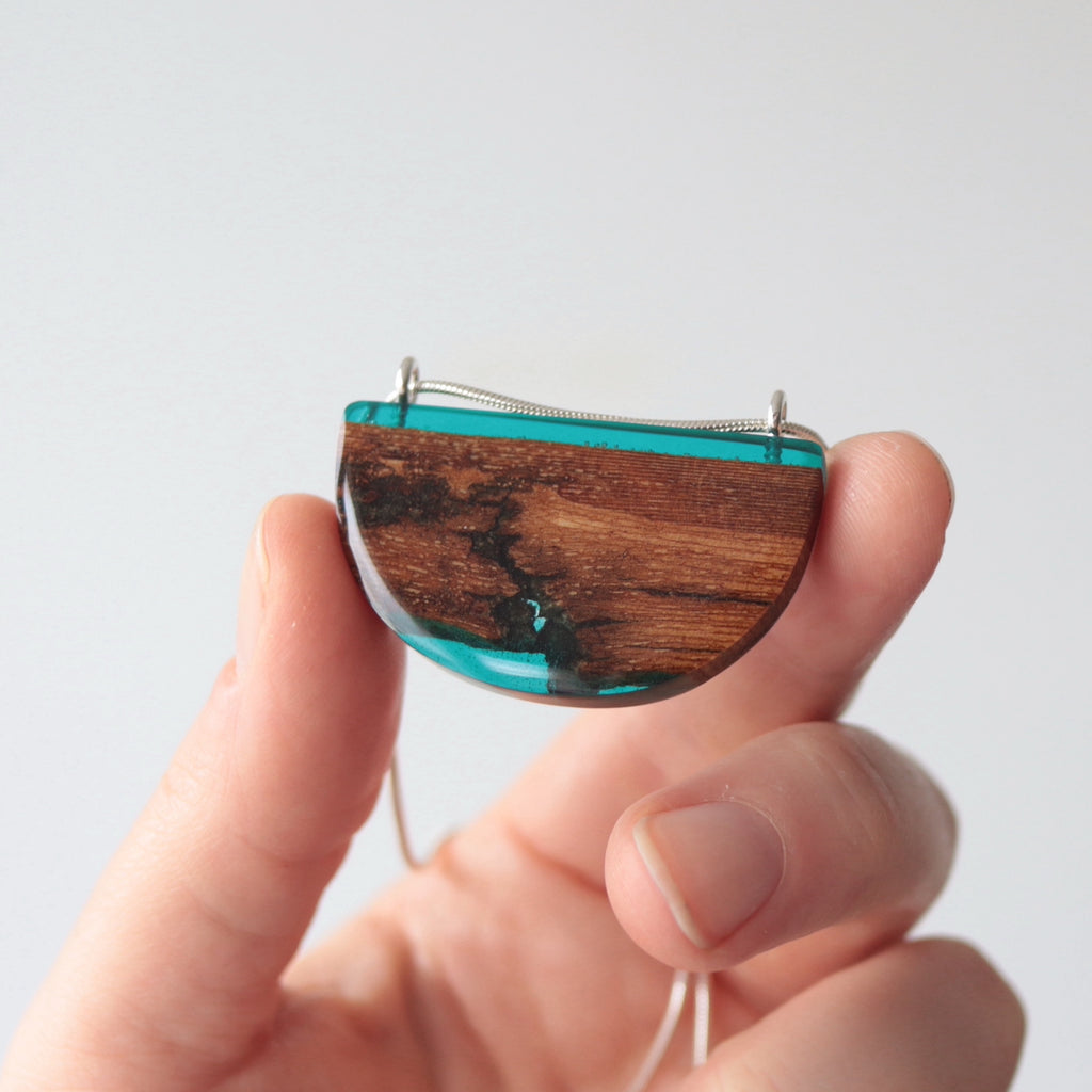 Reclaimed wood bark pendant with blue resin and silver chain by Wild Blue Yonder