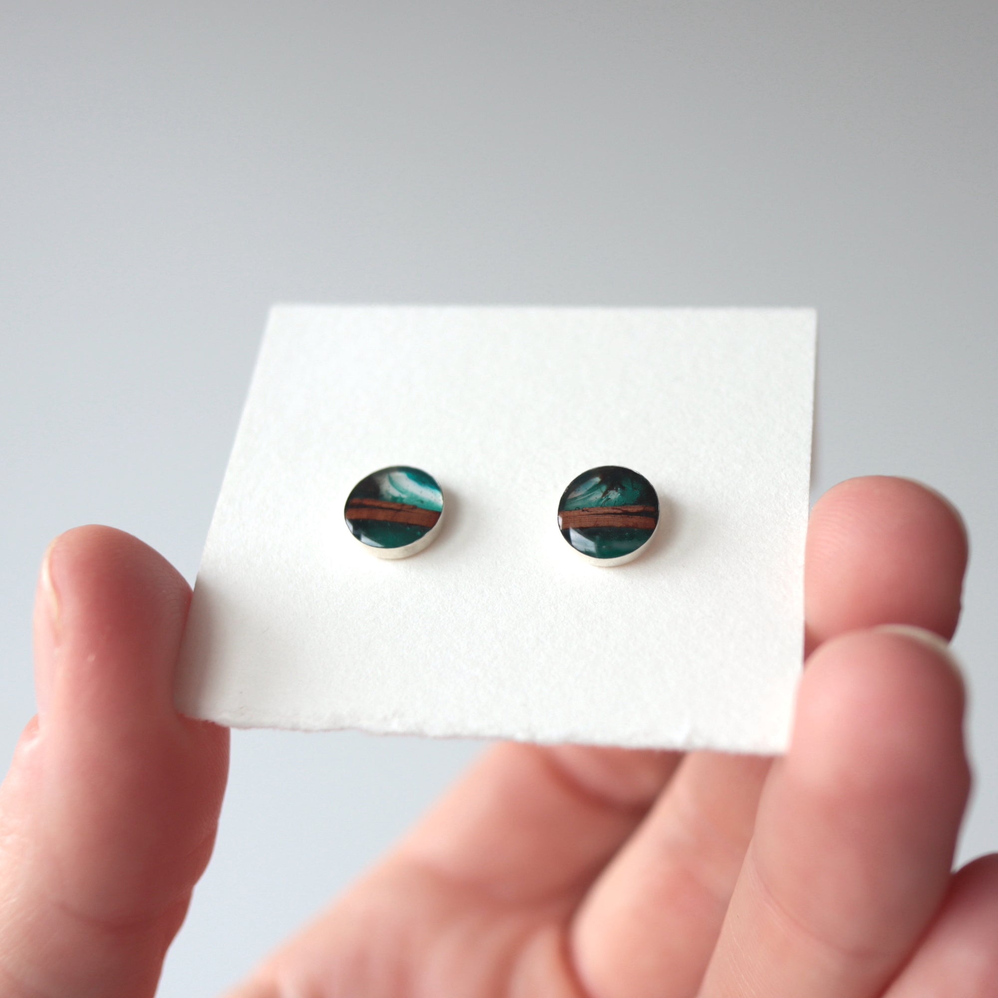 birch bark studs with sterling silver cups and blue resin by Wild Blue Yonder