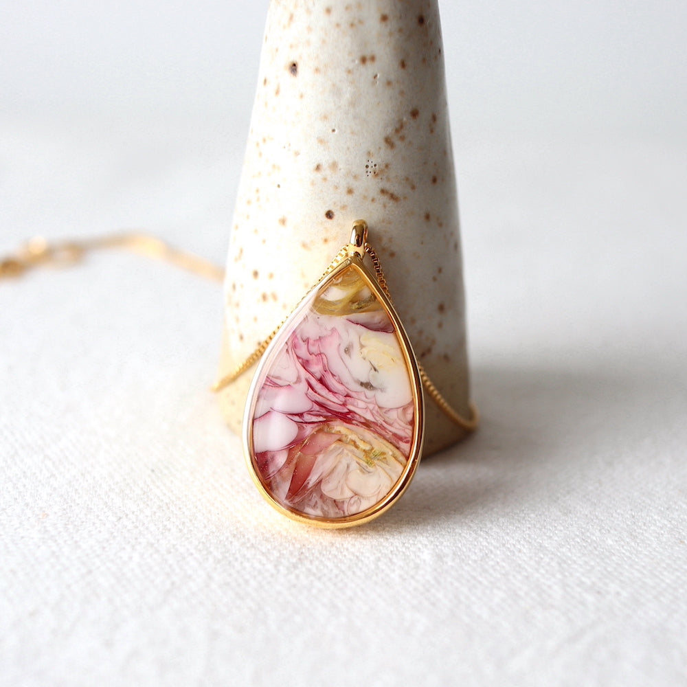 Florals. Encased Gold Teardrop Necklace with Dahlia Flower
