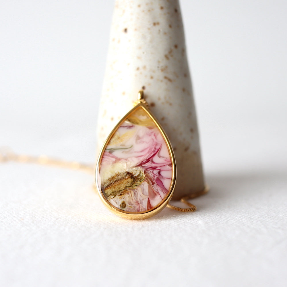 Florals. Encased Gold Teardrop Necklace with Dahlia Flower