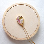 Load image into Gallery viewer, Florals. Encased Gold Teardrop Necklace with Dahlia Flower
