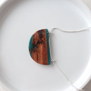 Reclaimed wood bark pendant with blue resin and silver chain by Wild Blue Yonder