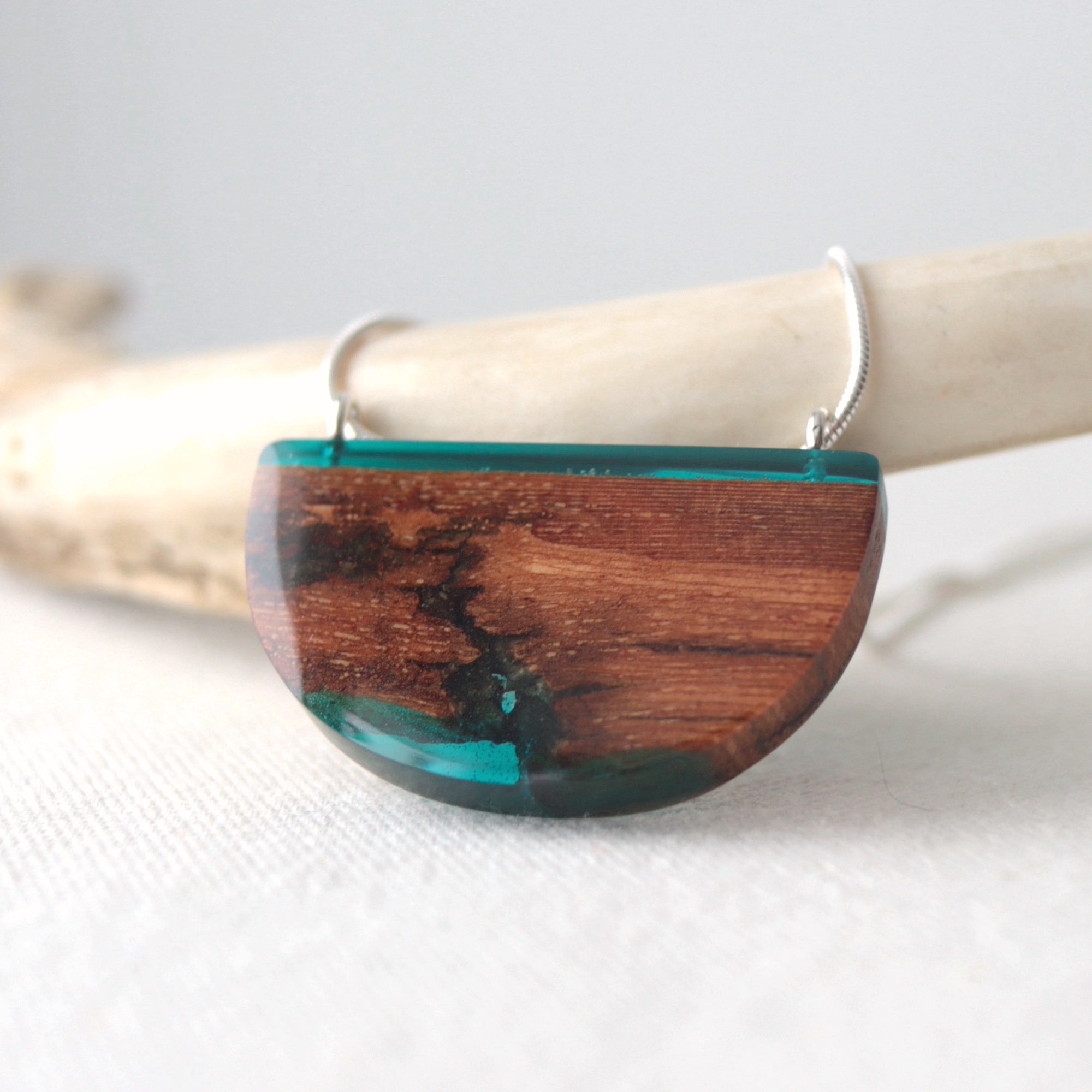 Reclaimed wood bark pendant with blue resin and silver chain by Wild Blue Yonder